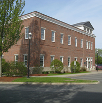 Picture of the bank's Operations Center, a 2 story brick building